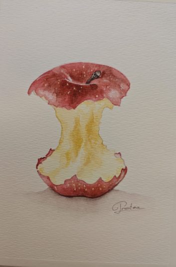 Manzana mordisqueada.